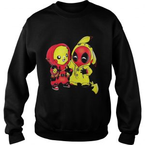 Ryan Reynolds showing off his PikachuDeadpool Sweatshirt