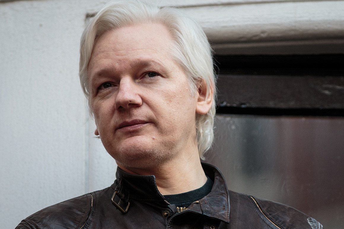 The Latest: Clinton says Assange must 'answer' for actions