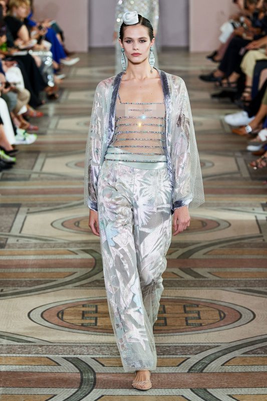 Round eyes because "bride" wearing "wedding dress"