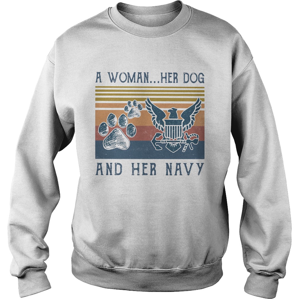 A woman her dog paw and her navy vintage retro Sweatshirt
