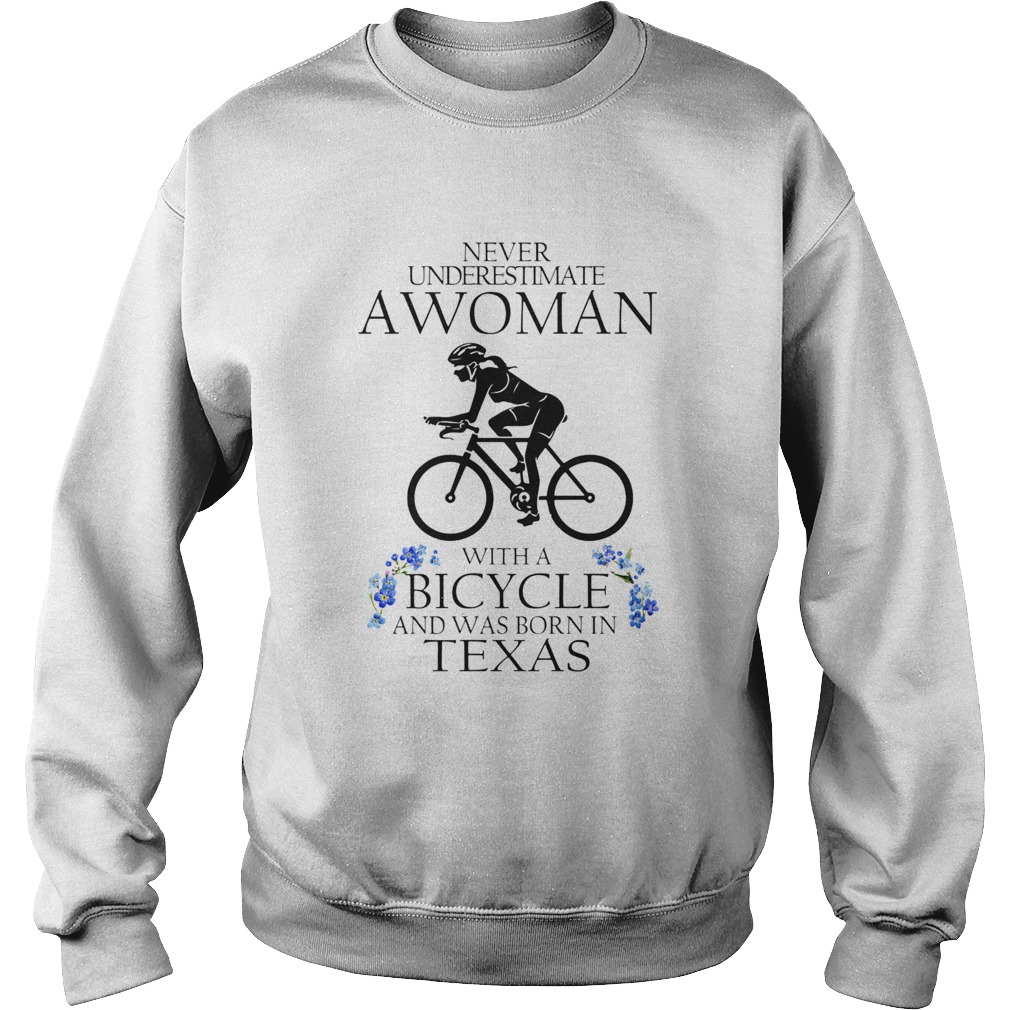 Never underestimate a woman with a bicycle and was born in texas Sweatshirt