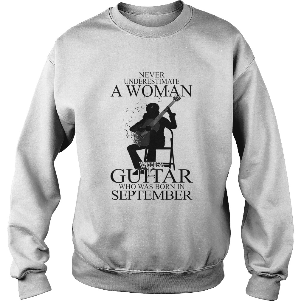 Never underestimate a woman with a guitar who was born in september Sweatshirt