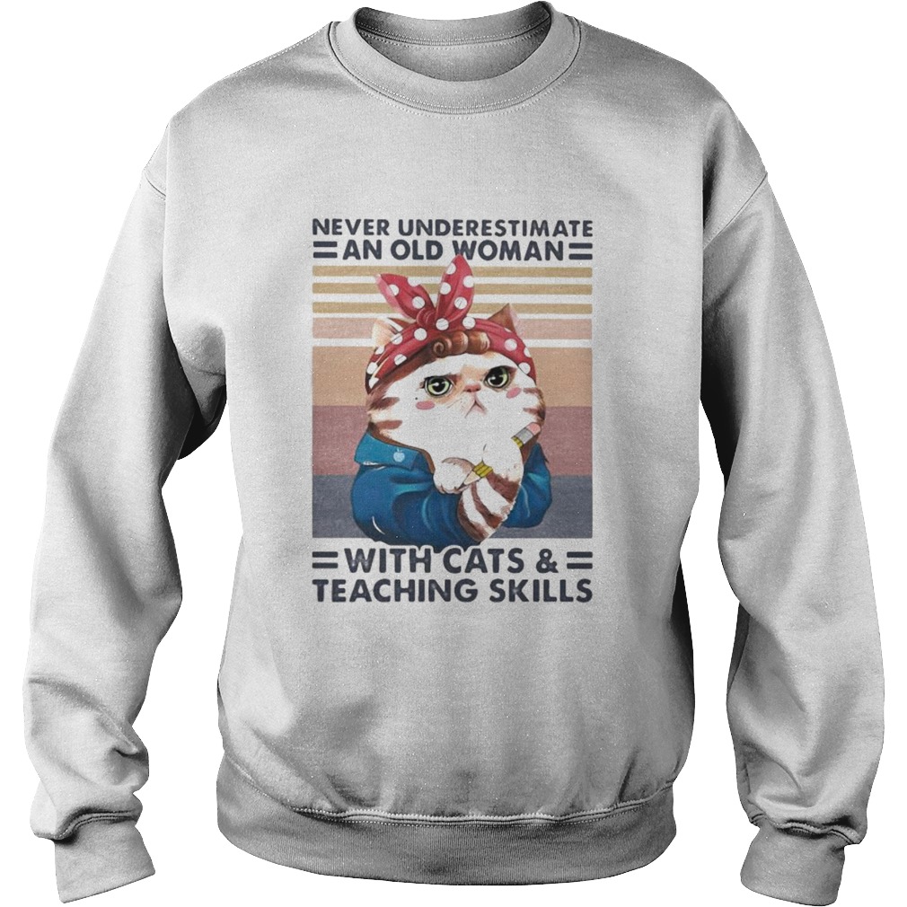 Never underestimate an old woman with cats and teaching skills cat ladies vintage Sweatshirt