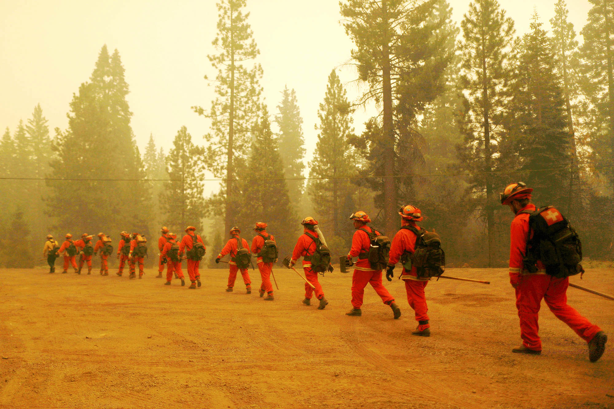 Historic wildfires in western US force ‘critical resource limitations’ as 21K battle blazes