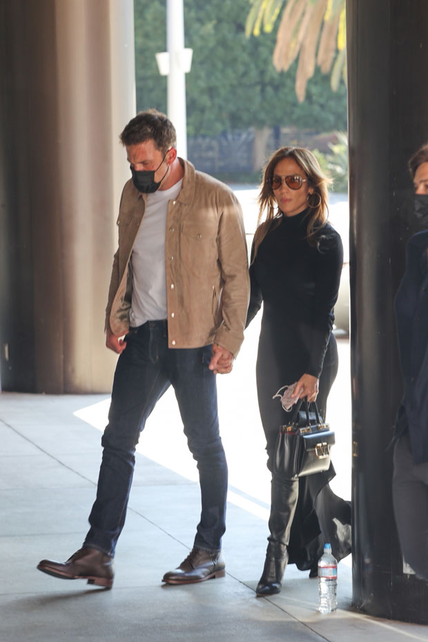 Ben Affleck and Jennifer Lopez held hands as they headed to a West Hollywood event on Oct. 3