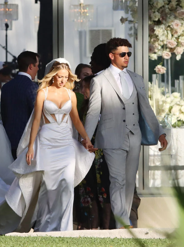 Brittany Matthews and Patrick Mahomes looking stylish at their wedding.