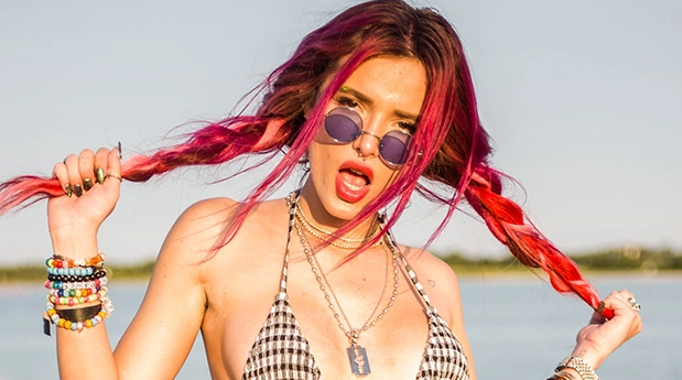 Bella Thorne Slays In Sexy CutoutSwimsuit On A Yacht In Cabo ‘Getting MyVitamin Sea’