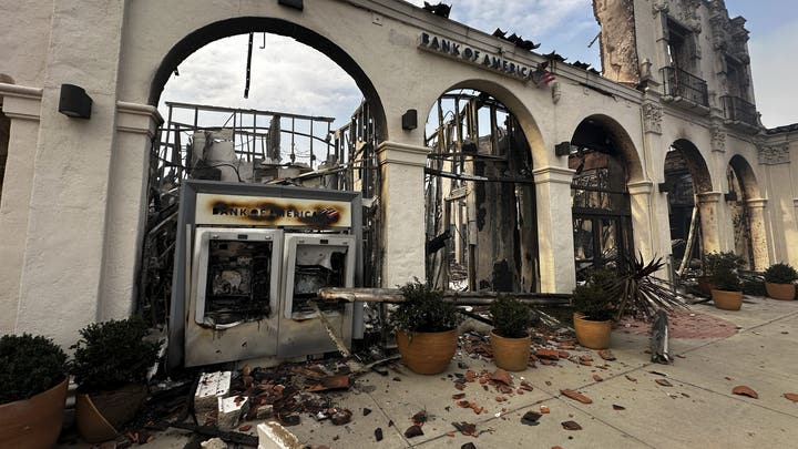 A fire-damaged Bank of America branch is seen after the Palisades Fire swept though in the Pacific Palisades neighborhood of Los Angeles, Wednesday, Jan. 8, 2025.