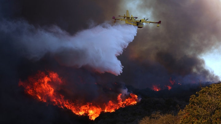 An airtanker made a drop on the Palisades Fire.
