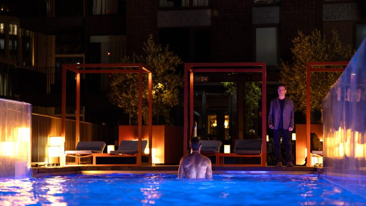 Charles Heller (Rami Malek) confronts Mishka Blazhic (Marc Rissmann) in a scene from 20th Century Studios’ The Amateur, opening in theaters April 11, 2025.