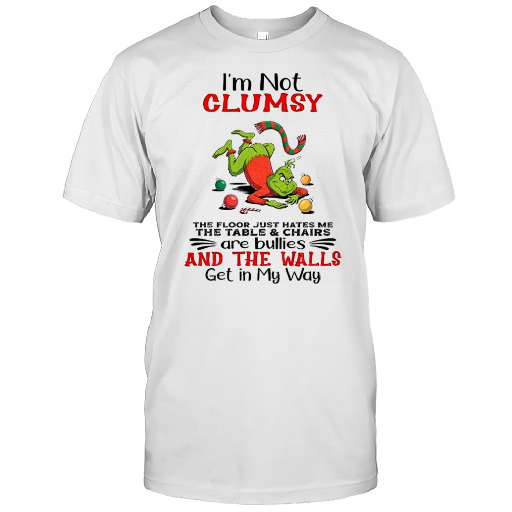 Grinch Santa hat I’m not clumsy the floor just hates me the table and chairs are bullies and the walls Christmas shirt