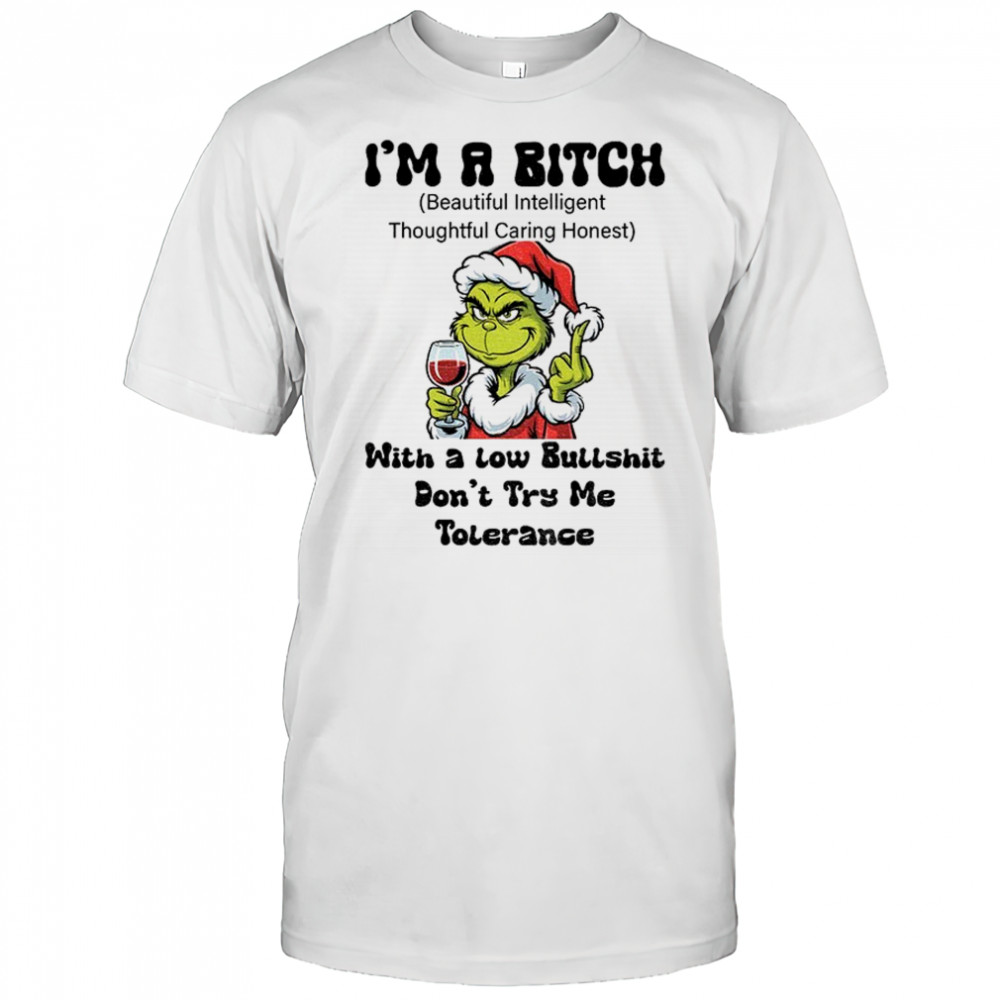 Grinch Santa hat middle finger I’m a bitch with a low bullshit don’t try me tolerance Christmas shirt